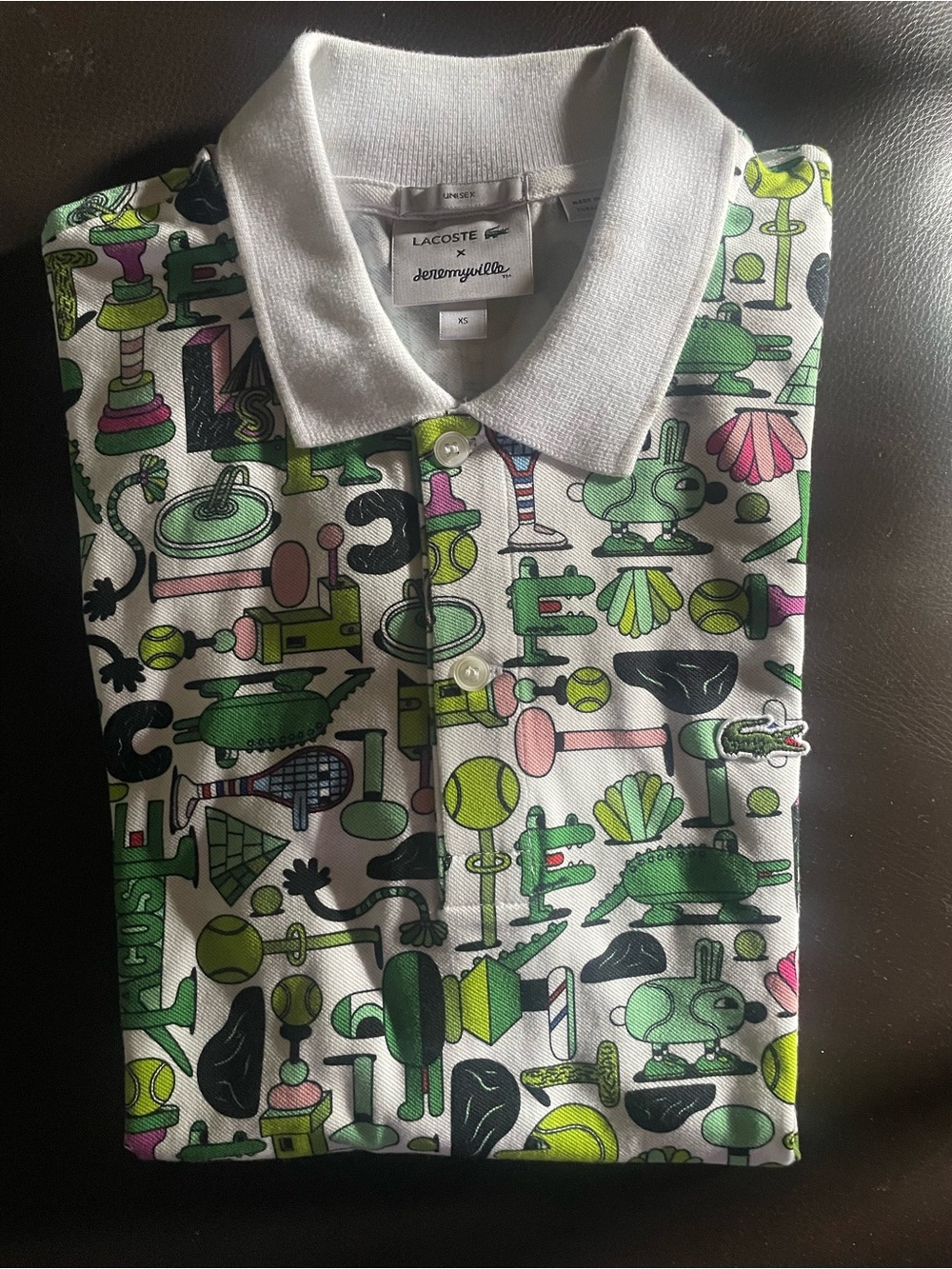 Lacoste Graphic Polo in White with Green & Pink Accents